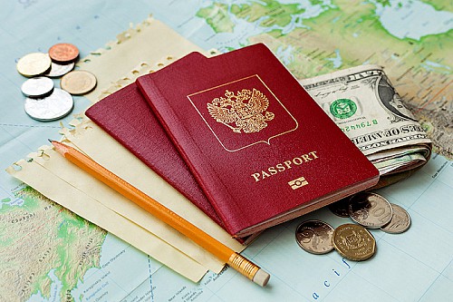 The tax-neutral or offshore person status through second citizenship or residency programs